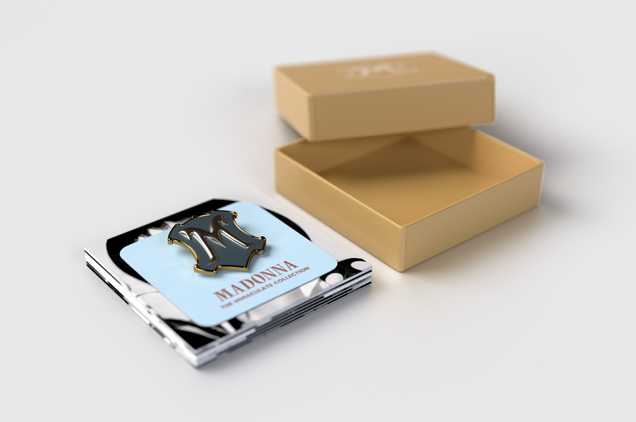 Madonna "The Immaculate Collection" box set design, CD box opened with CDs stacked with shield pin