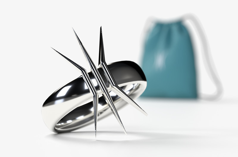 My design of a custom sterling silver ring in the shape of Madonna's "Ray of Light" album logo