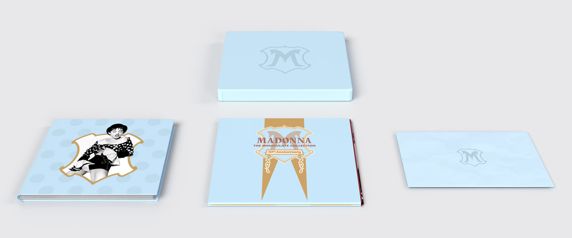 Madonna "The Immaculate Collection" box set design, vinyl box opened with the LP, book and envelope of posters