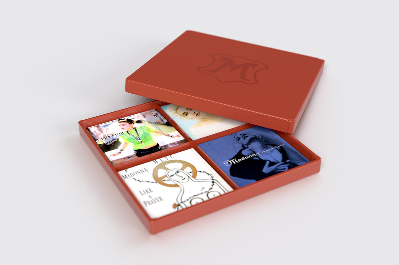 Madonna "The Immaculate Collection" box set design, red box opened to reveal singles