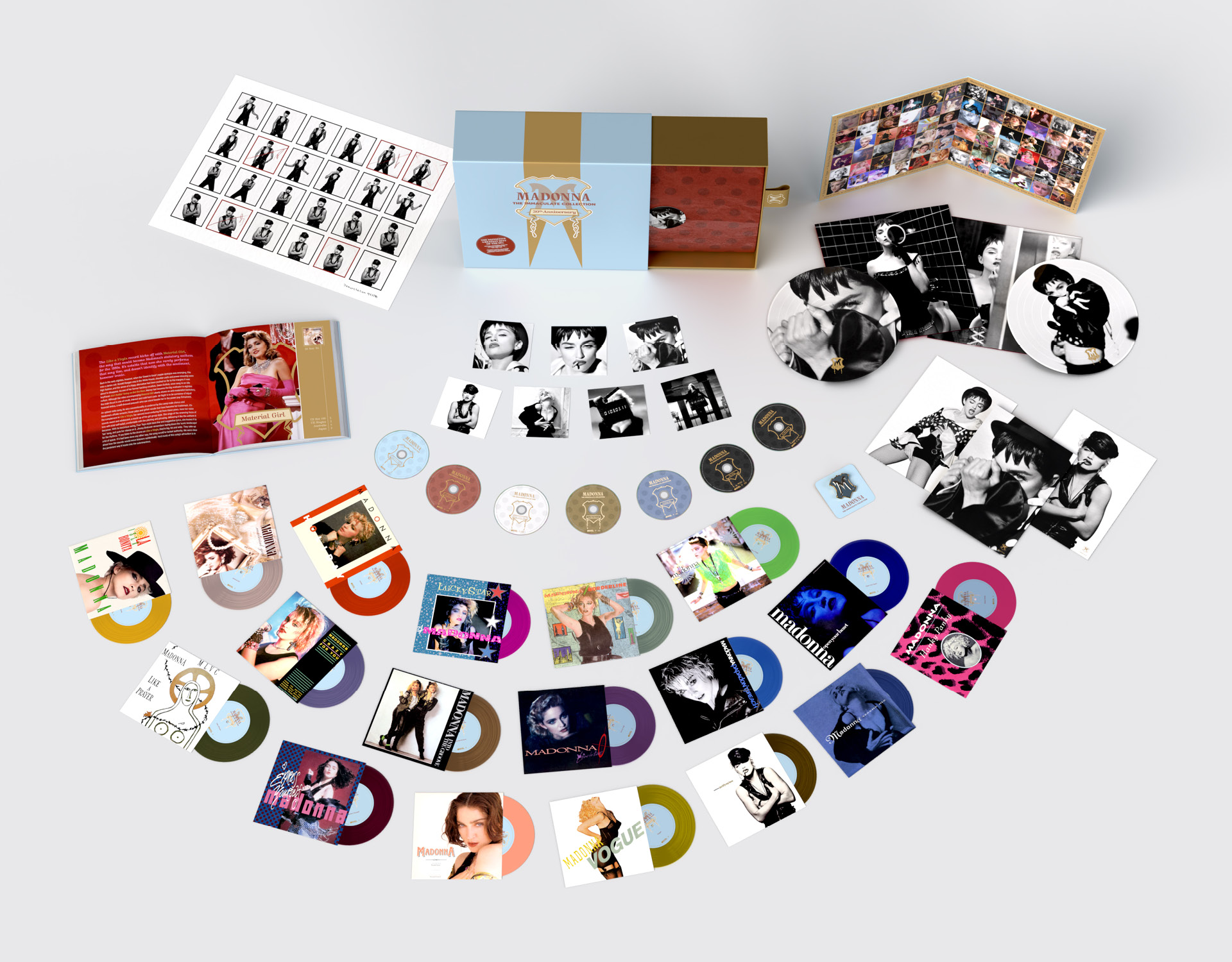 Madonna "The Immaculate Collection" box set design, spread with boxes opened and vinyl, CDs and book visible