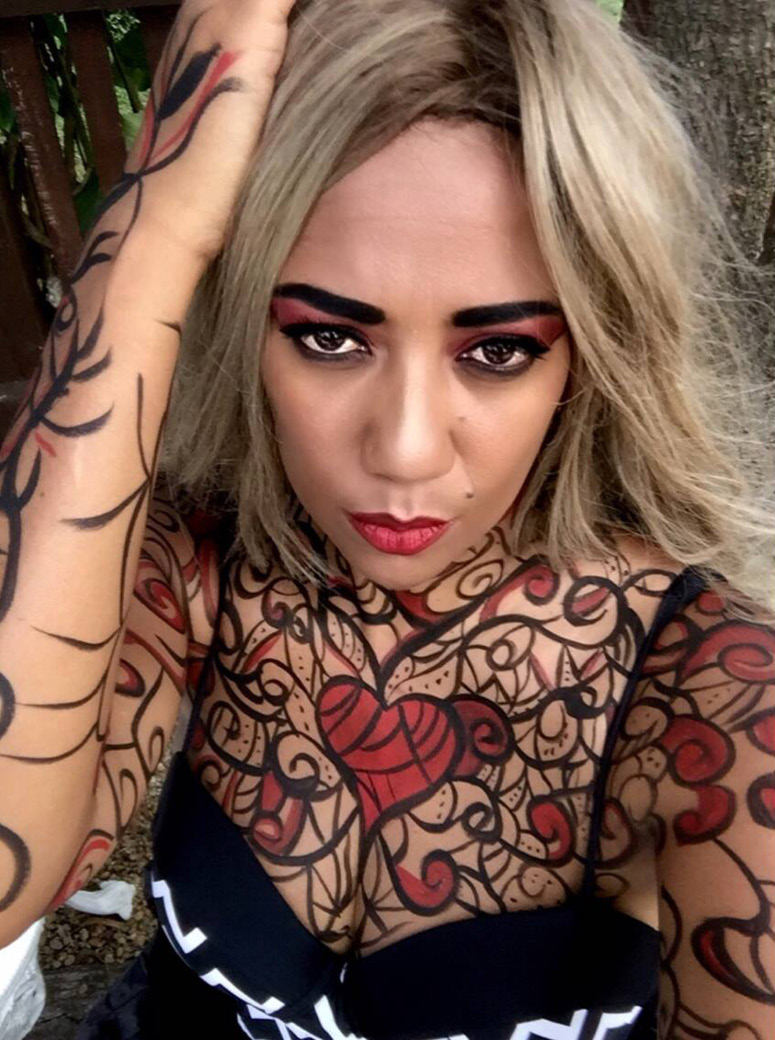 Makeup artist Isadora Blake wearing Poison Candy makeup as body paint