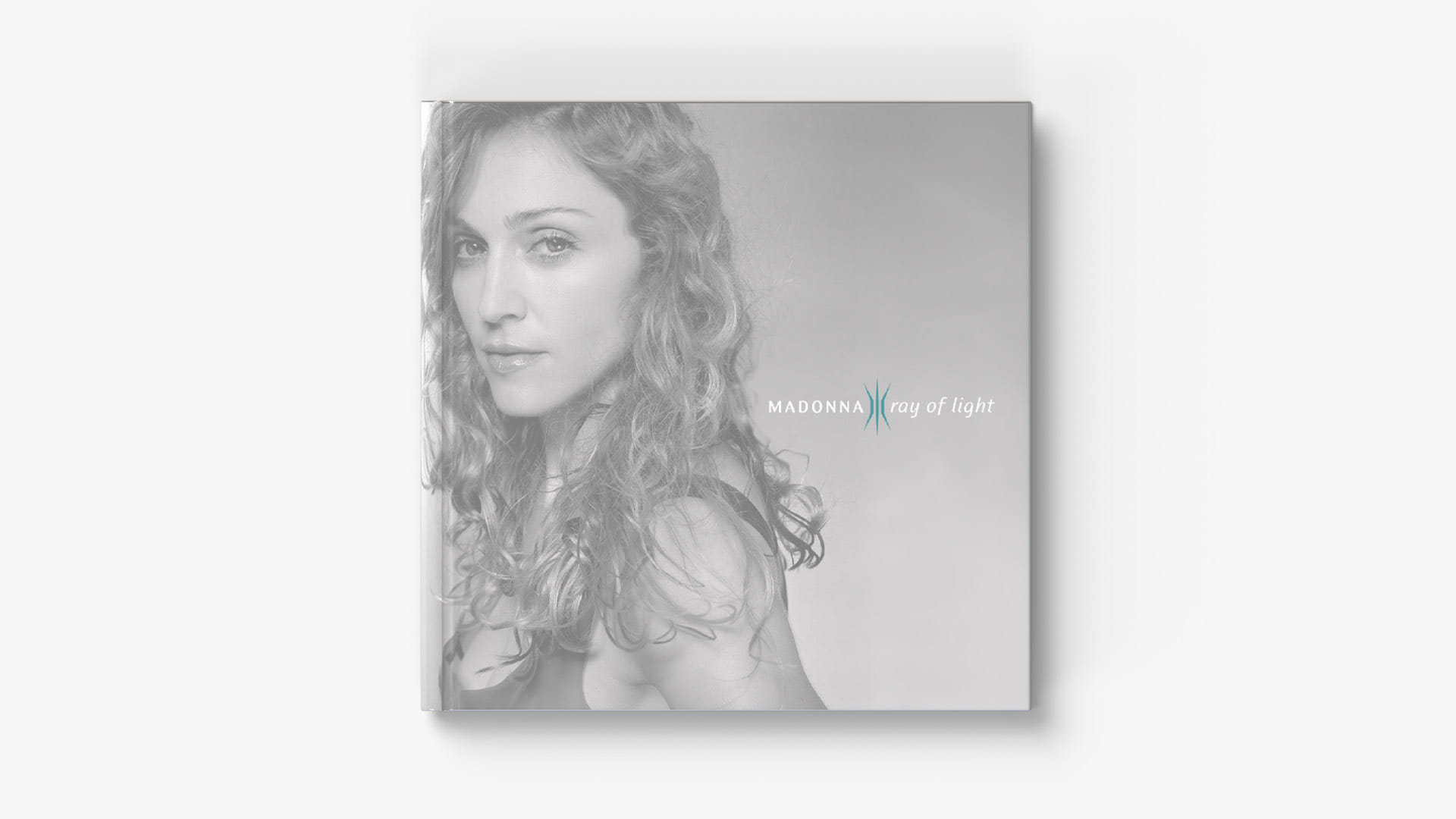 My design of a hardcover book focused on the making of Madonna's "Ray of Light" album, front cover.