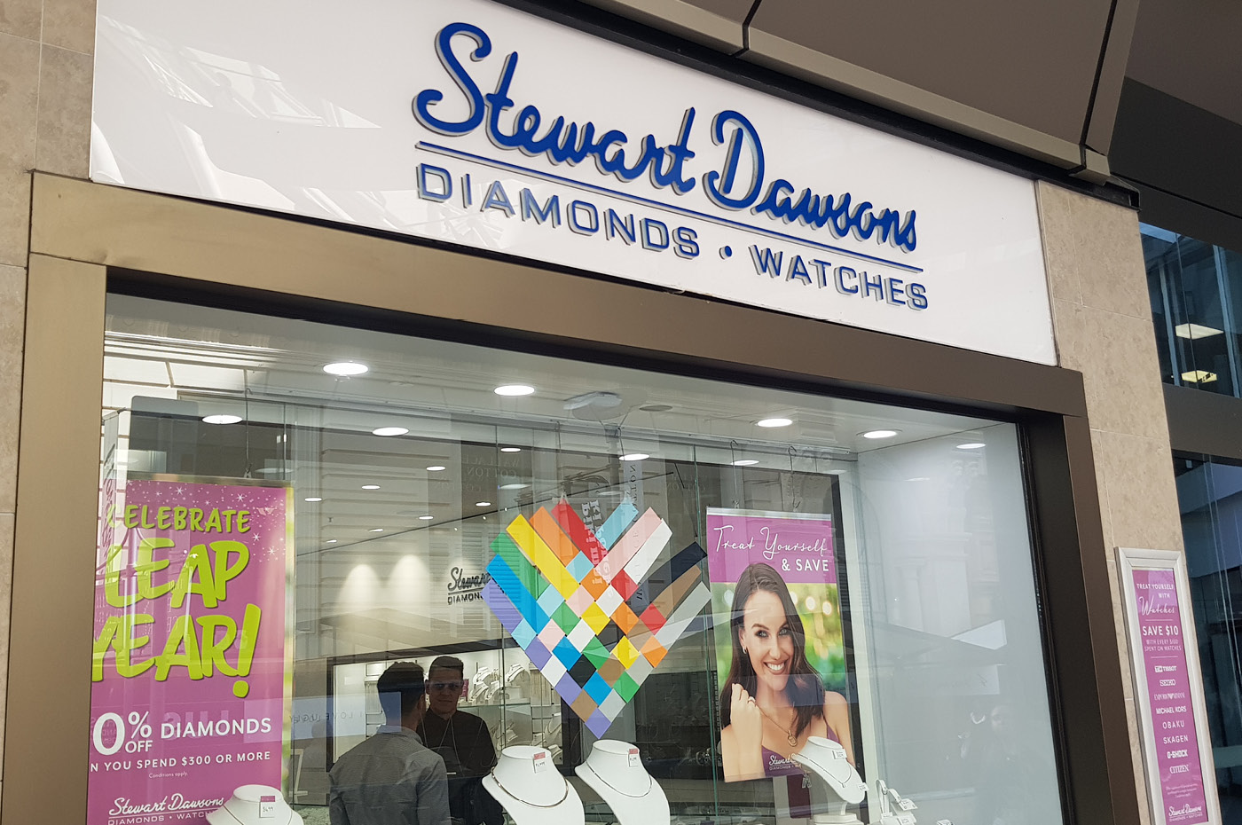 Stewart Dawsons' hand-made Wellington Pride Festival 2020 logo window decoration
